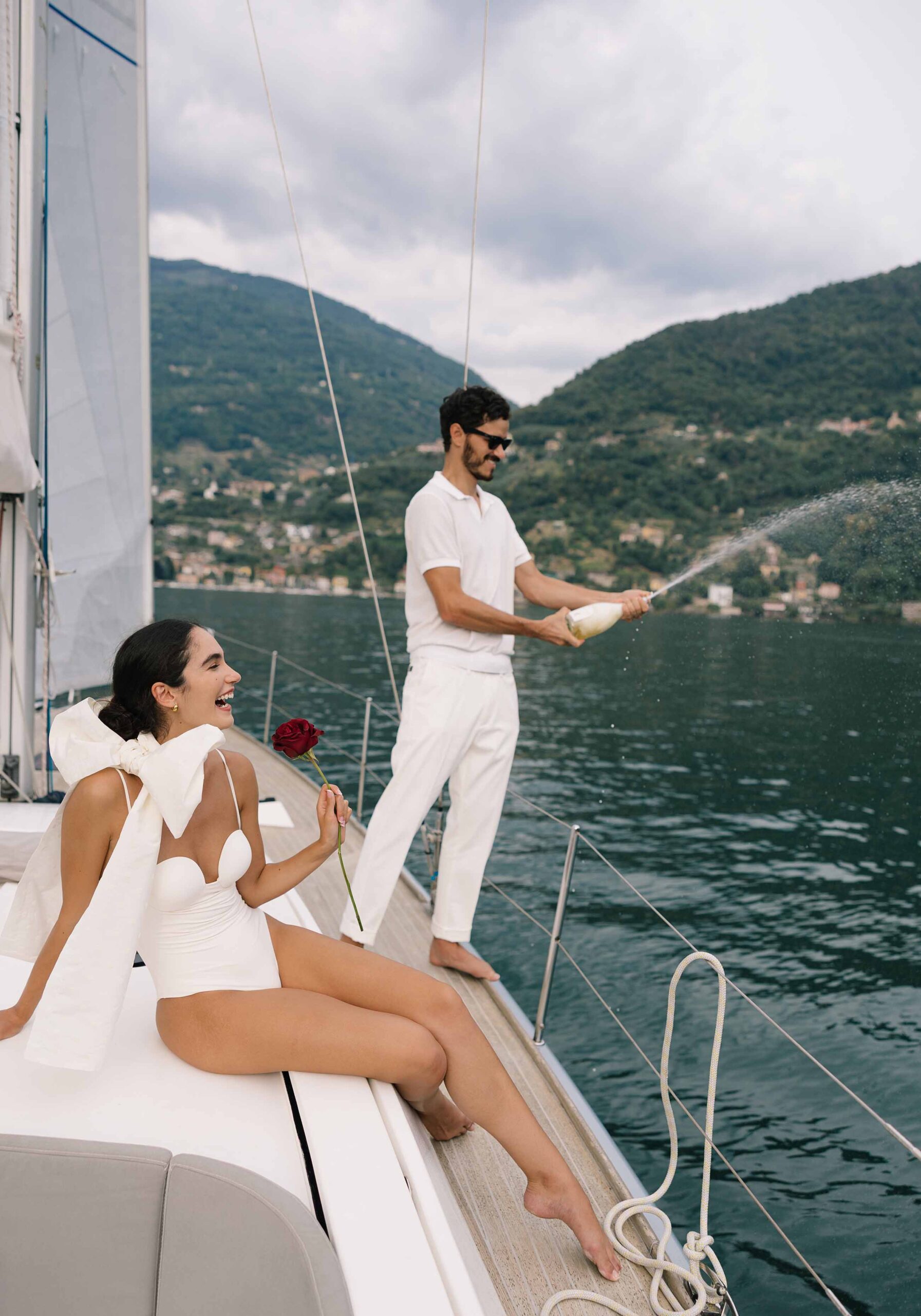 Model couple wedding editorial shoot on a sailboat