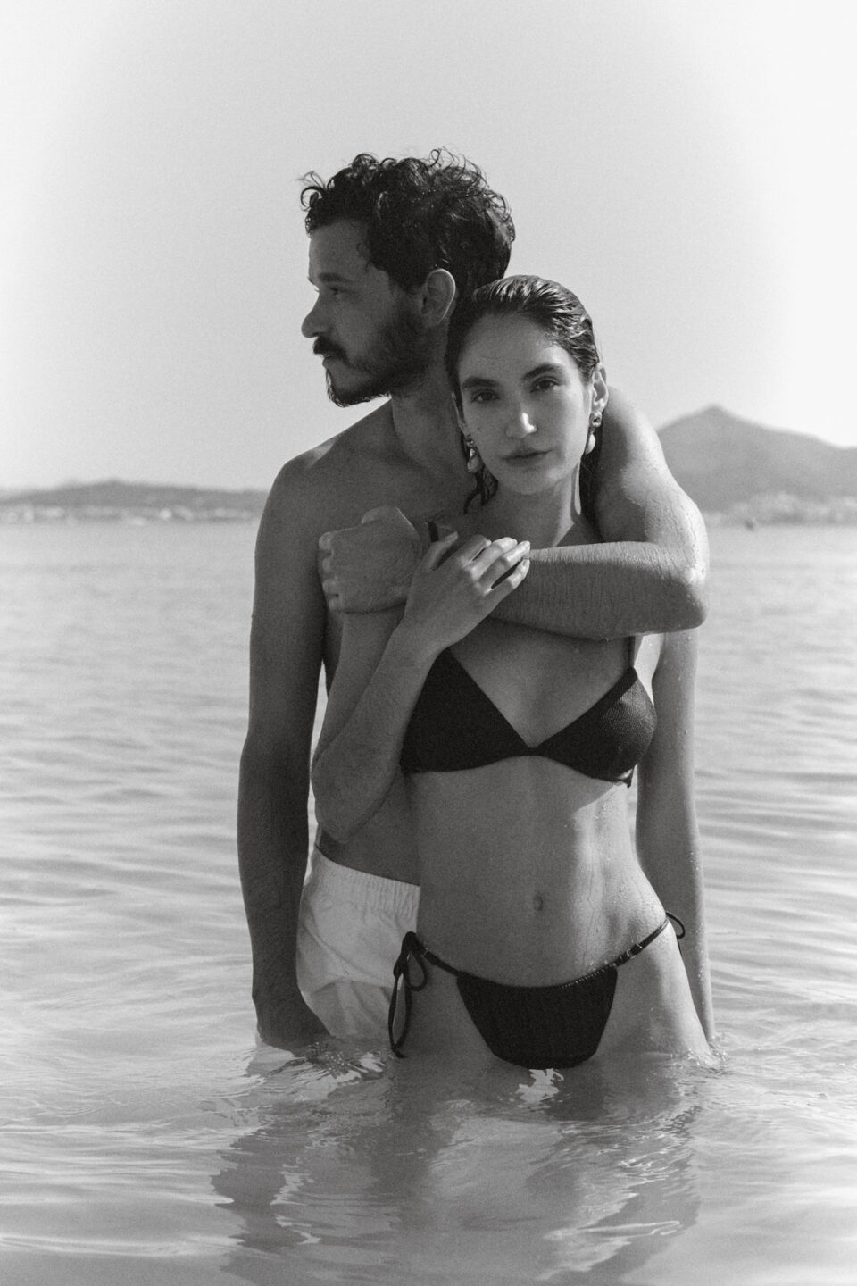 Model couple in water posing